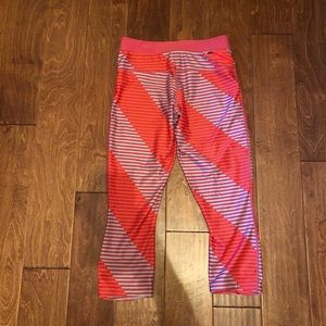 Nike Pants - Nike cropped leggings orange and red striped sz M Nike Pants - Nike cropped leggings orange and red striped sz M